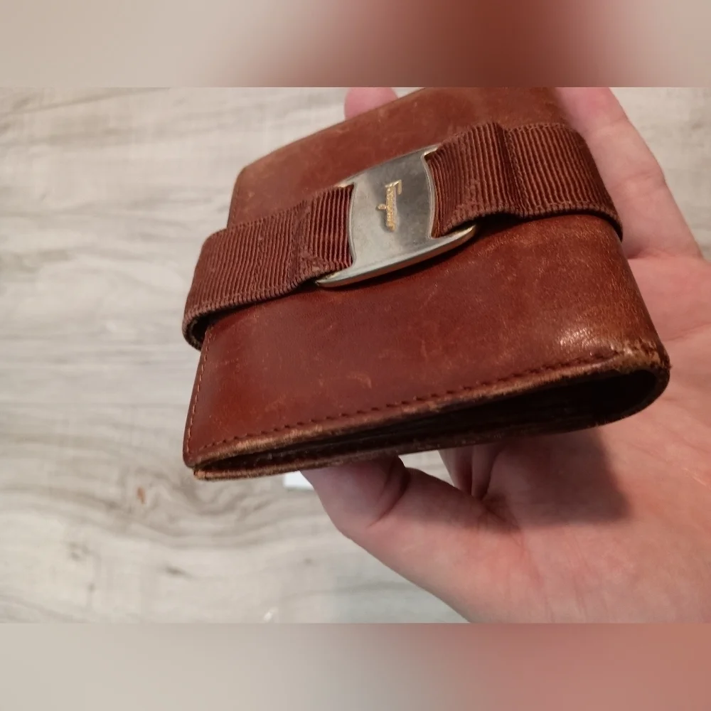 Salvatore Ferragamo Vintage Vara Bi-fold wallet Embossed leather Brown